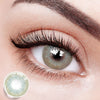 Wearing Moonbeam Green Colored Contact Lenses