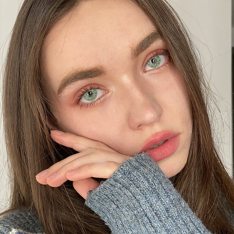 A Girl Wearing Ever Light Green Contact Lenses
