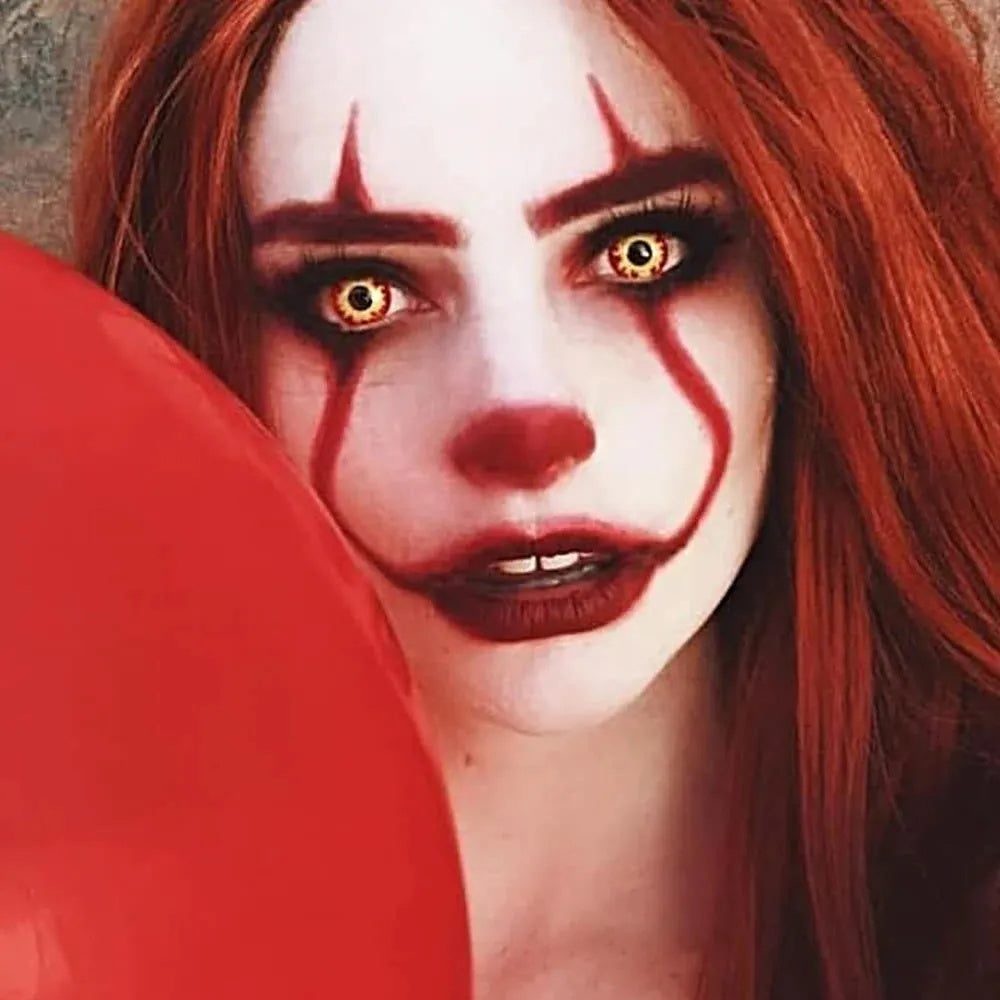 A Woman Wearing Crimson Fiery Sunburst Yellow Contact Lenses