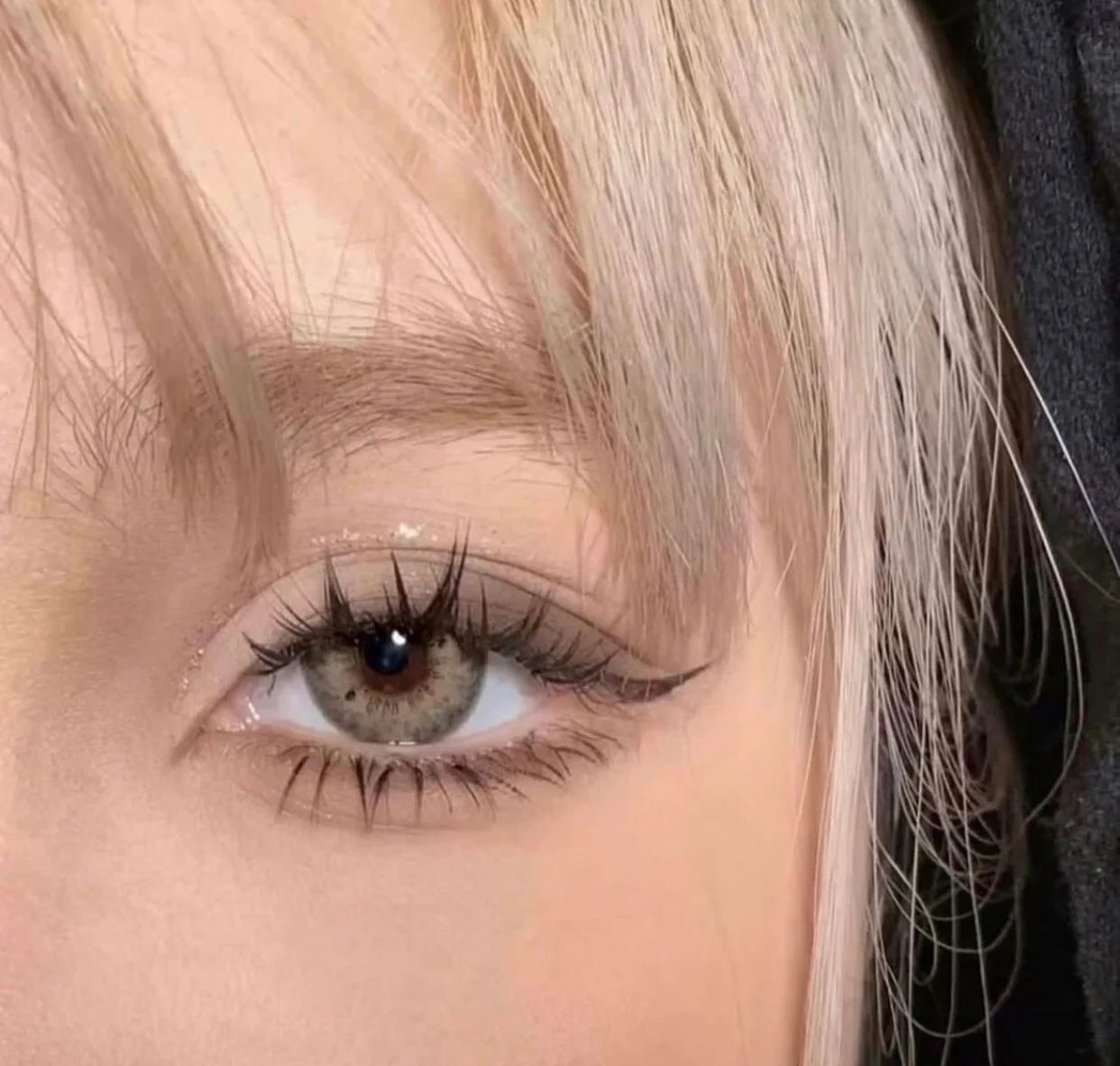 A Beautiful Woman Wearing Stormy L-Brown Colored Contact Lenses