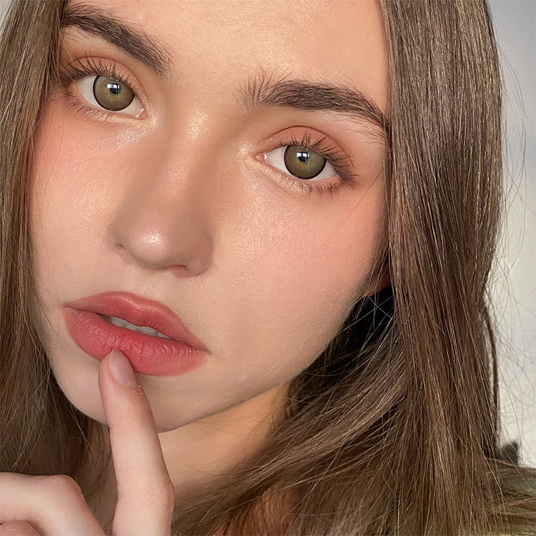 A Girl Wearing Starlight Brown Contact Lenses
