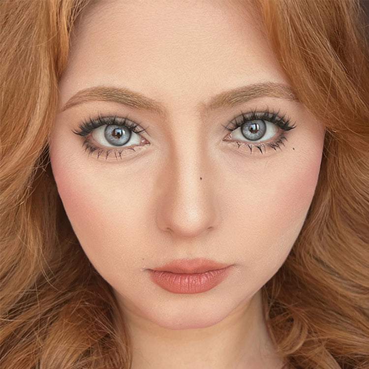 A Girl Wearing Elegant Blue Contact Lenses