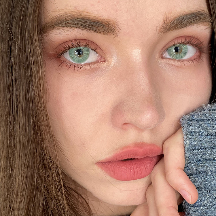A Girl Wearing Ever Light Green Contact Lenses