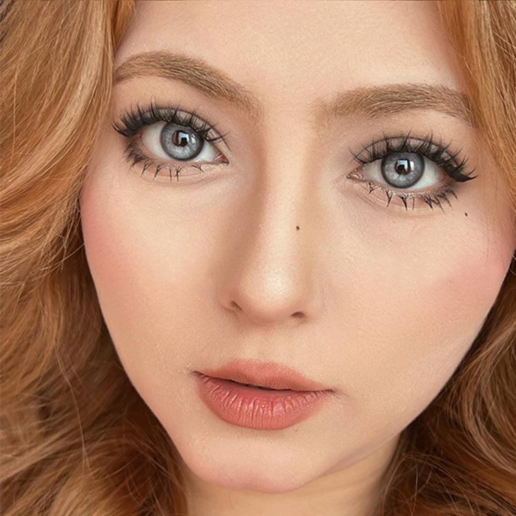 A Woman Wearing Elegant Blue Contact Lenses