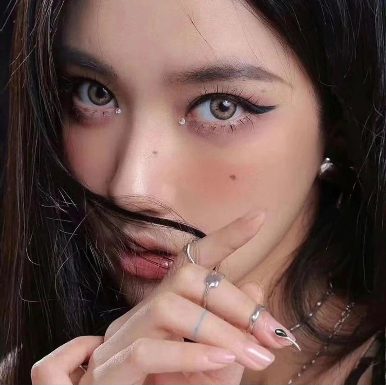 A Beautiful Woman Wearing Stormy L-Brown Colored Contact Lenses