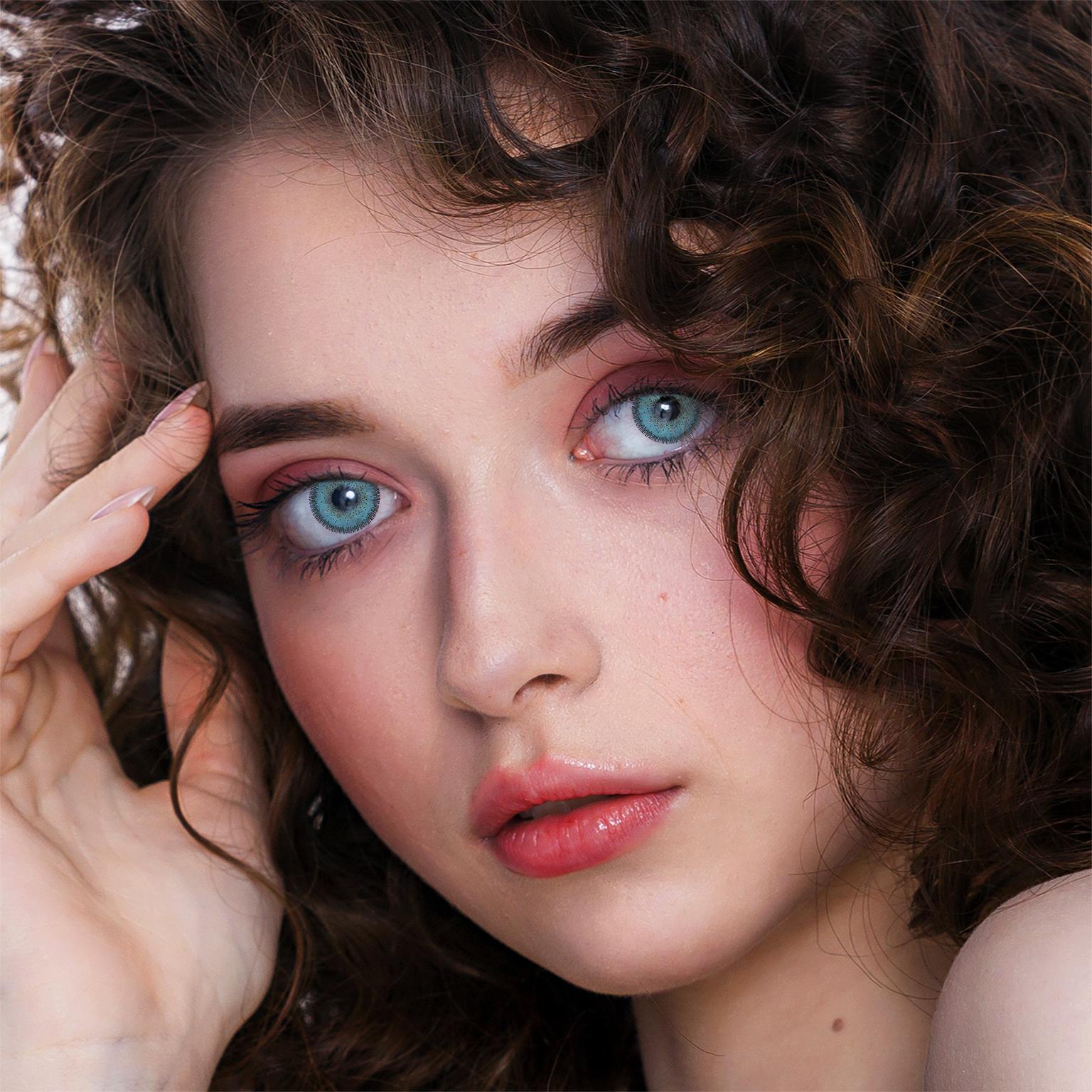 Beautiful Woman Wearing Magic Blue Colored Contact Lenses